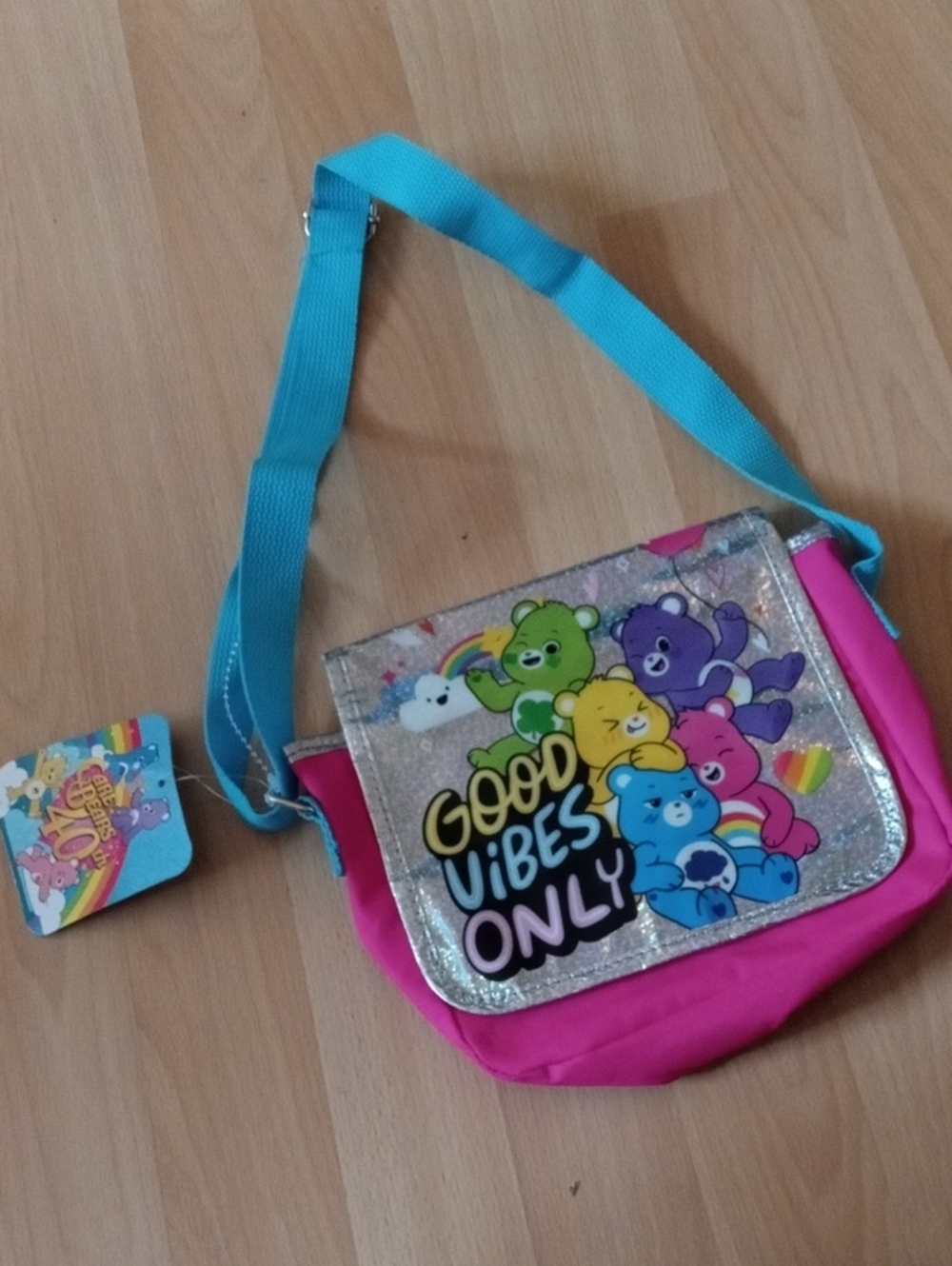 $10>>Care Bears Pink and Teal Kids Crossbody Bag with Glitter Flap